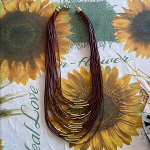 Elegant Multi-Strand Necklace with Gold Accents